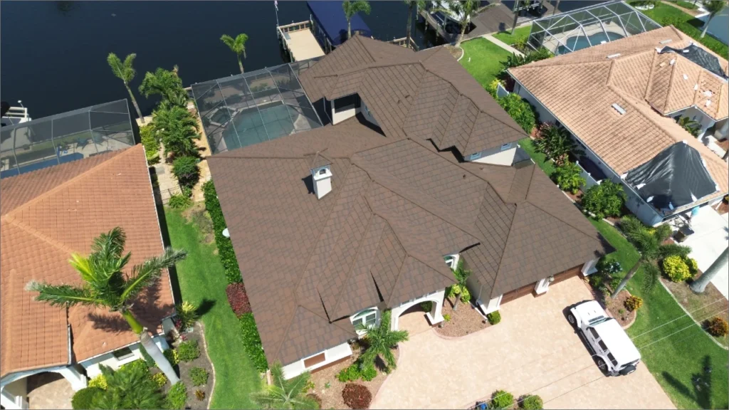 Residential home with new roof by roofing company in Collier County, FL