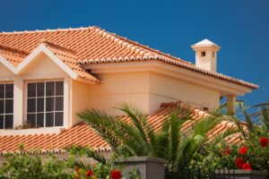 Orange tiled roof of a large house in tropical climate