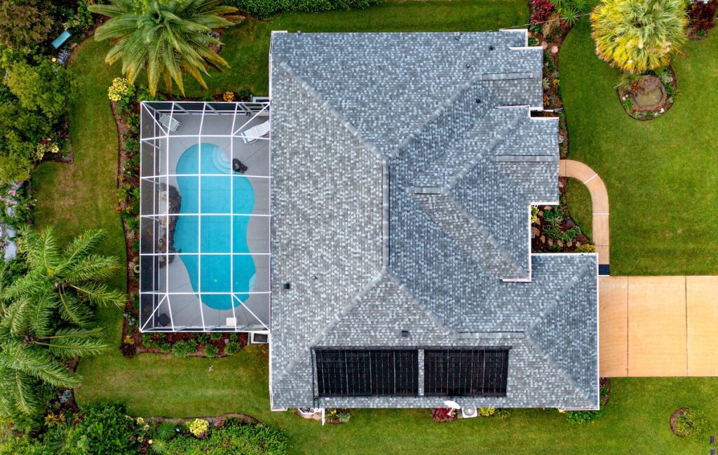 Aerial view of asphalt roofing on Florida home
